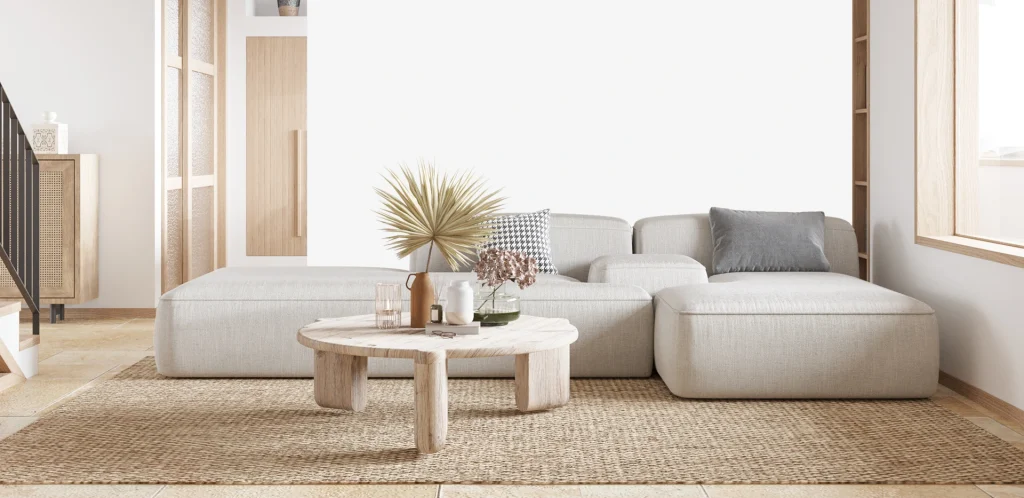 Scandinavian style interiors with cream sofa and natural rug.